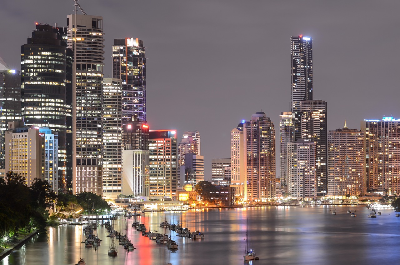 Image shows the bright city lights of Brisbane at night